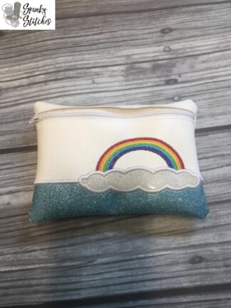 rainbow zipper bag in the hoop embroidery design by spunky stitches
