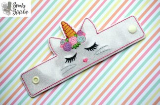 kittycorn wristlet in the hoop embroidery file by spunky stitches