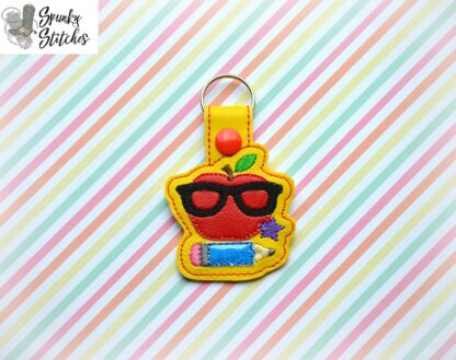 nerdy apple key fob in the hoop embroidery file by spunky stitches