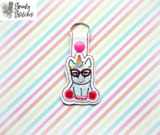 nerdy unicorn key fob in the hoop embroidery file by spunky stitches