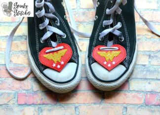wonder woman shoe lace tags in the hoop embroidery file by spunky stitches