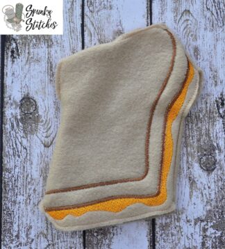 grilled cheese elf costume in the hoop embroidery file by spunky stitches