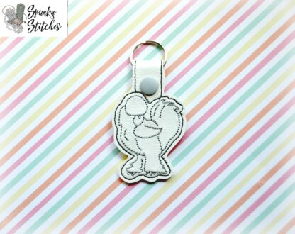 Silkie Chicken key fob in the hoop embroidery file by spunky stitches