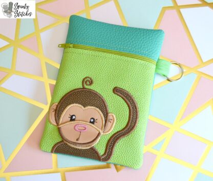 Monkey Flap Zipper Bag in the hoop embroidery file by Spunky stitches