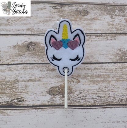 Unicorn Sucker holder in the hoop embroidery file by Spunky Stitches.