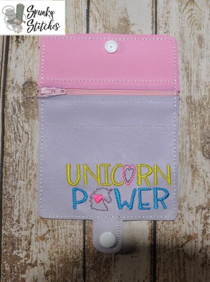 Uicorn Power Zipper Wallet in the hoop embroidery file by Spunky stitches