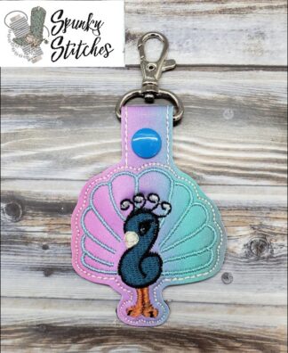 peacock Key Fob in the hoop embroidery file by Spunky stitches