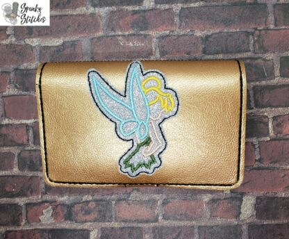 TInkerbelle mini zizpper wallet in the hoop embroidery file by Spunky stitches